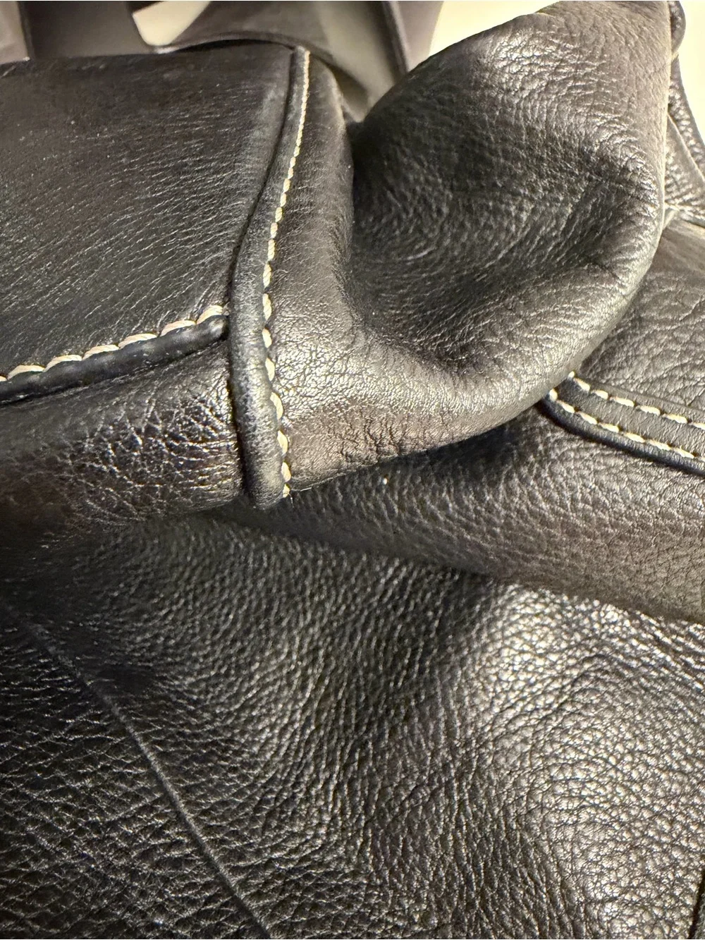 The Sak “PO Asbury” large pebbled black leather hobo/shoulder bag.